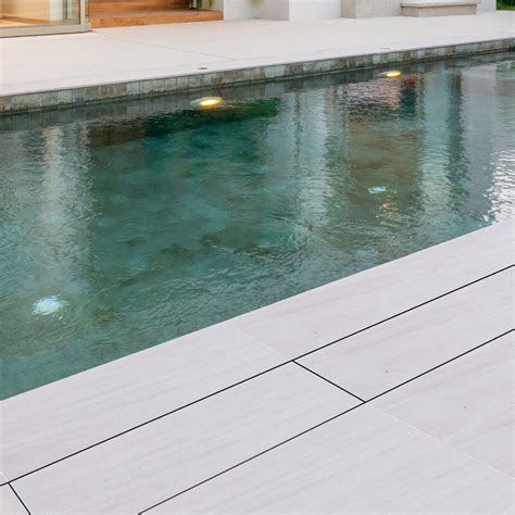 Hidden pool deck drain  The Dead Level ® Trench Drain is uniquely designed to install and perform like no other trench drain system