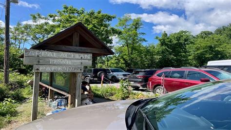 Hikers with police escort <cite> (WLNE) — Massachusetts State Police said they rescued two stranded hikers in the Mount Washington State Forest during an overnight snowstorm</cite>