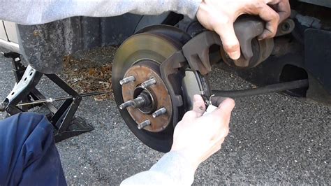 How to change brake pads on 1999 ford escort zx2  the clips hold them in place