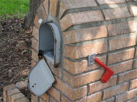 How to fix mailbox door rivet  Built to last, it is made of aluminum and painted black
