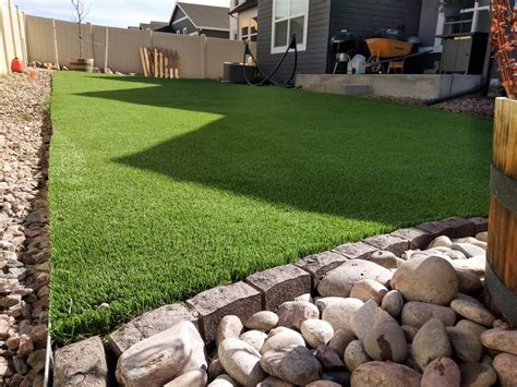 Installing artificial turf next to pavers  It also makes cleanup easier — you