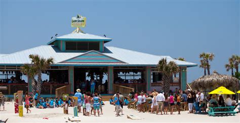 Landshark landing pensacola  LandShark Landing Beach Bar LandShark Landing is one my very favorite Pensacola Beach wedding venues, and this was the first wedding they hosted since the pandemic began in spring of 2020! This fun, beachy, and colorful outdoor venue was back and better than ever