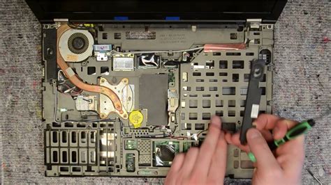 Lenovo t410 disassembly  (This is called a captive screw