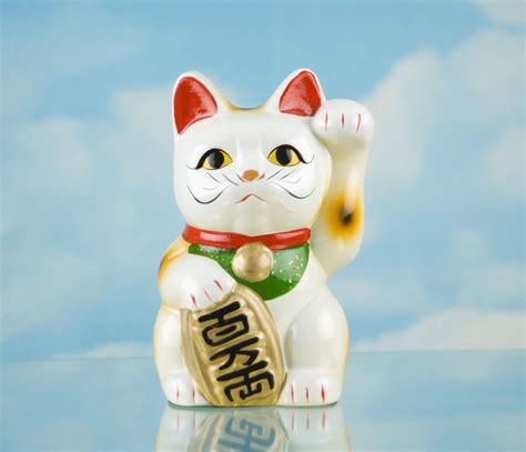 Lucky cat The story of lucky cats: how they were invented, what the difference colours mean and where to find them in Japan