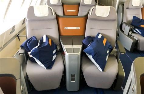 Lufthansa flight 413 seat map  Turkish does not use the pods in their business class layout but a lay flat seat with an ottoman on the back of the passenger’s seat located ahead of your row
