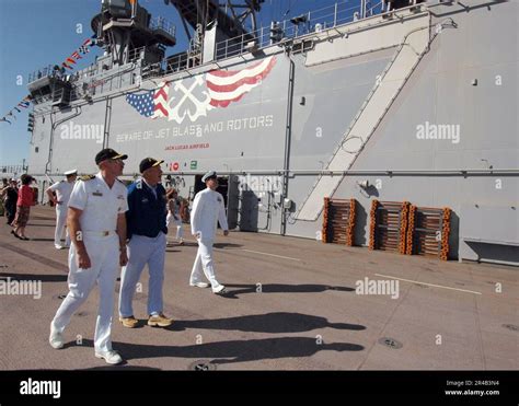 Military escort officer with george bush ERIC BARADAT/Getty