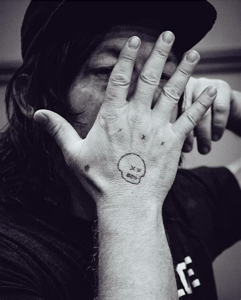 Norman reedus hand tattoo meaning The Walking Dead's latest episode "Stradivarius" got us better re-acquainted with this time-jump version of Daryl Dixon (Norman Reedus), who has taken "off the grid" living to a whole new extreme