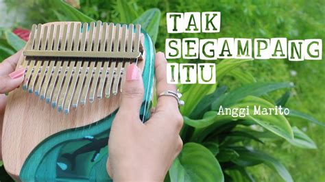 Not kalimba lagu tak segampang itu So, this video is about lyrics for a beautiful song called " Tak Segampang Itu ", originally by Anggi Marito