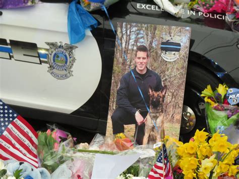 Officer gannon escort from funeral home  Reuters - 12 Sep 2021, 9:58am