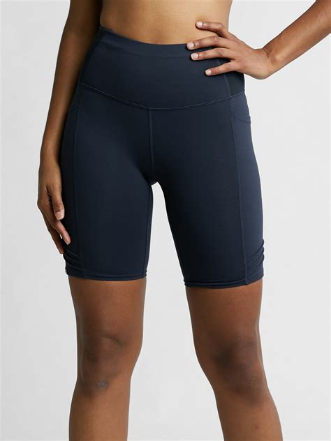 Oiselle shorts  Oiselle Roga Shorts in size 10 Back zip pocket and mesh "toolbelt" pockets at waist