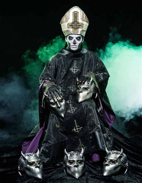 Papa emeritus iii escorted off stage 