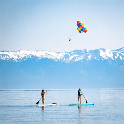 Parasailing at lake tahoe  The location offers stunning views of Lake Tahoe and the surrounding mountains, making it a perfect place to take in the natural beauty of the area