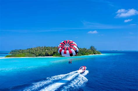 Parasailing in maldives  Reethi Faru Resort