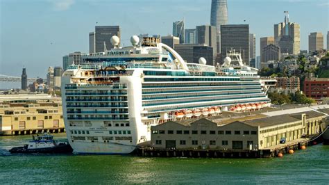 Pictures of ruby princess  Amenities: Two twin beds that convert to a queen-sized bed sitting area with a balcony desk spacious closet flat-screen television refrigerator and a bathroom with shower