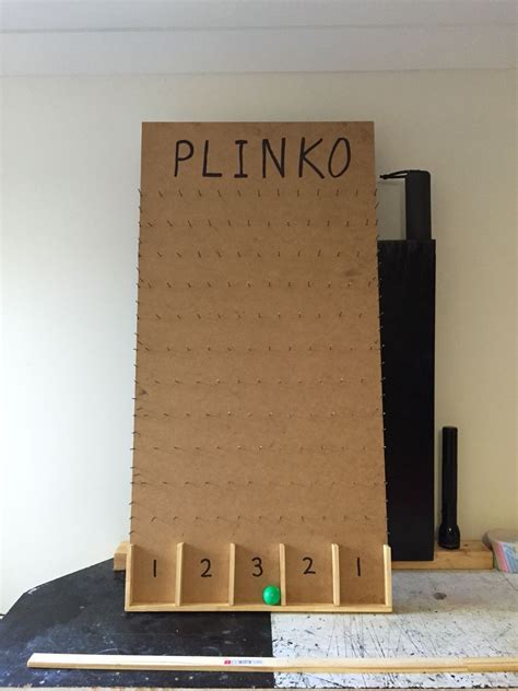 Plinko video game  On each level there is a slope to one side – this creates certain obstacles for the ball, so it can move to the right or left during the downward movement