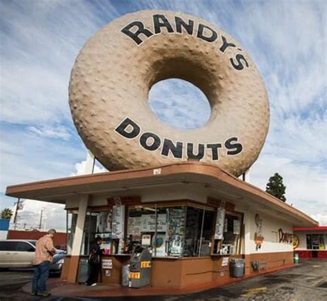 Randy's donuts san diego photos  Cake donut tossed in cinnamon, crumb and powdered sugar