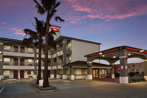 Red roof inn galveston texas Streamlined rooms, some with kitchenettes, in a low-key budget hotel featuring an outdoor pool