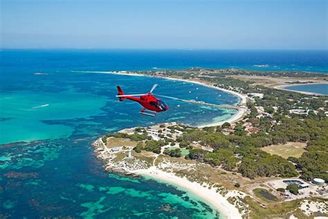 Rottnest island helicopter flights  Rottnest Island with its lighthouse, gun turrets, spectacular coastline and sheltered beaches