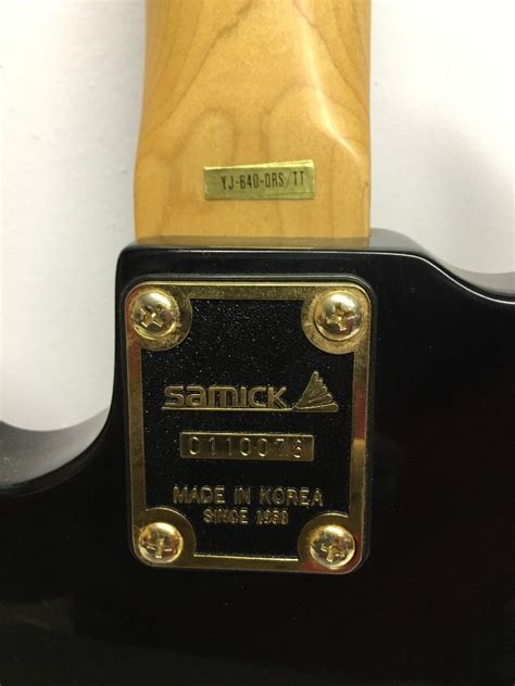 Samick serial number decoder  What is the serial number on it? Some of the Samick guitars' serial numbers start with the last two digits of the year made as the first two digits of the serial