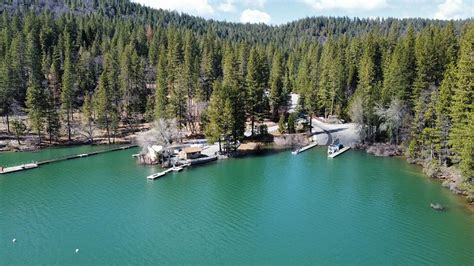Scotts flat lake reservations 77 acres of land, boasts 3,550 square feet of living space, featuring 4 bedrooms, and 3 baths