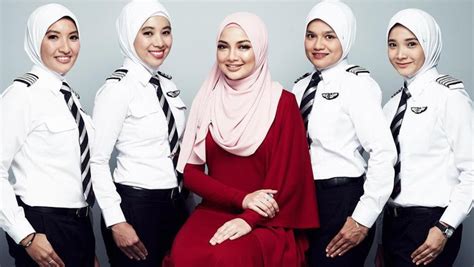 Seragam pilot wanita berhijab  Rp175