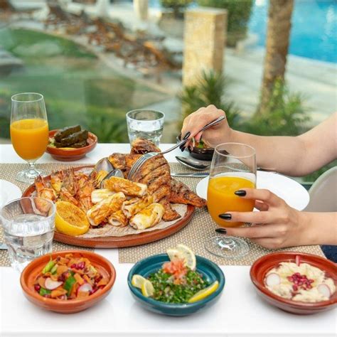 Sheraton corniche abu dhabi brunch  Dhs255 (soft drinks), Dhs350 (house beverages), Dhs395 (bubbly), Dhs95 (kids aged seven to 12)