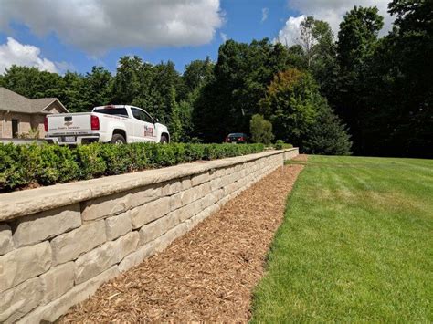 St johns mi retaining walls , tiered Cobblestone retaining wall system to reform and hold the property from eroding into the lakeshore