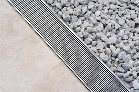 Stainless steel grates for driveways  SMC/GRP - Josam's PRO-PLUS® trench drain system is