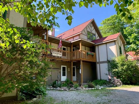 Sunset condos mackinac island  Enjoy a beautiful sunset over the Straits of Mackinac on your own deck! This unit has everything you need with a full kitchen, fast Wi-Fi, in-unit laundry, and more