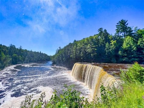 Tahquamenon falls hotel  Look for the big black and yellow sign on the corner of M