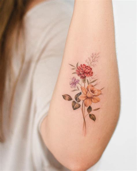 Tattoo monatsblumen  The color of the ink makes a big difference, too, as the lighter the ink, the faster it fades (remember that next