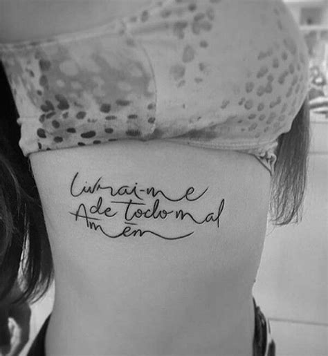 Tatuagem feminina livrai me de todo mal amem  Frases bonitas para tatuar: “apenas amor”