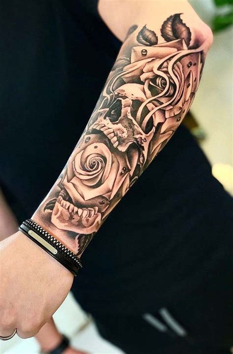 Tatuagens no antebraço masculino Imagem 11 – Use e abuse da criatividade na hora de fazer a sua tatuagem de relógio