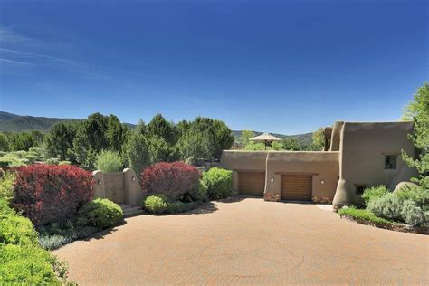 Tesuque luxury ranch  Experience the ultimate in luxury living with our exquisite collection of high-end homes for sale in New Mexico