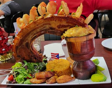 The mofongo king photos  Our specialty is the Mofongo topped with your choice of meat