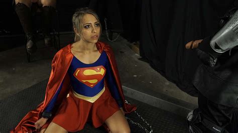 The rye films superheroine  Kara is overwhelmed and cannot stand against both Amber and her new Master