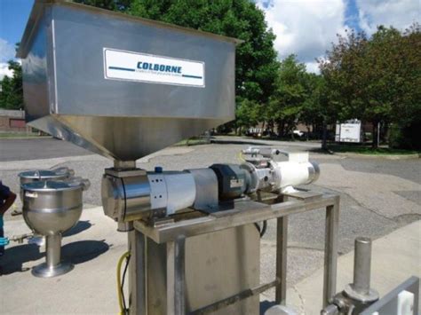 Used colborne rotary pump filler  A hopper is often mounted on top of the rotary valve