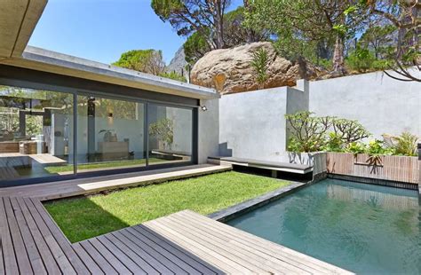 Villa minima camps bay  Villa Maxima is a stylish new luxury villa in Camps Bay is ideally located in a quiet cul-de-sac in the wind-sheltered Glen area, offering spectacular sea views from both levels