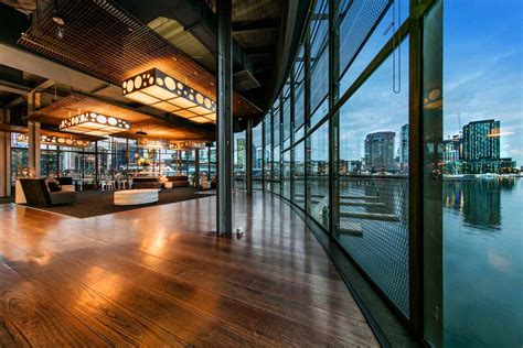 Waterfront venue hire melbourne  120 person Private Space at Shop 1, waterfront side of NAB building, 800 Bourke Street, Docklands VIC 3008, Australia