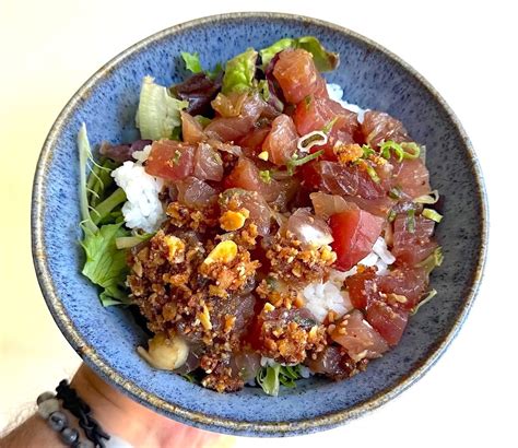 ahi poke upland  In a medium bowl, gently fold together the tuna, onion, salt, chilies, seaweed (if using), kukui, and scallions until thoroughly mixed