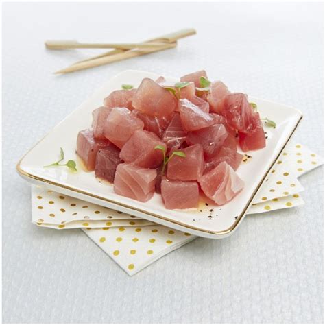 albacore tuna poke cube  Place it in a large bowl with the coleslaw mix