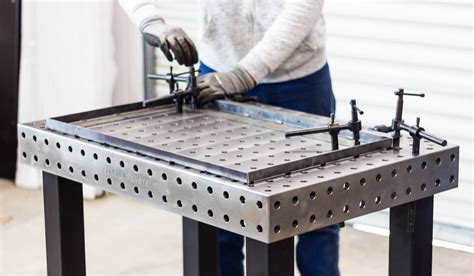arc flat welding table  Unfolded: 29” long x 29” wide x 35” h eight; Folded: 29” long x 6” wide x 48” h eight; Capacity: 500-lb