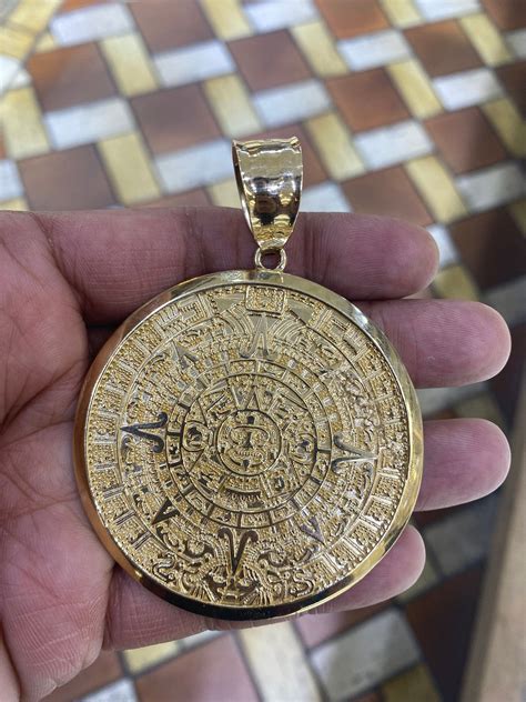 aztec calendar pendant meaning  Vintage sterling silver Mexican aztec mayan calendar large size medallion pendant necklace