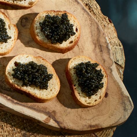 baika caviar OVERNIGHT GUARANTEED, BESTER Premium Osetra Sturgeon Caviar - 1 oz-30 gm pack - Malossol Ossetra Black Roe - Premium Quality, Traditional Style, imported with free mother of pearl spoon