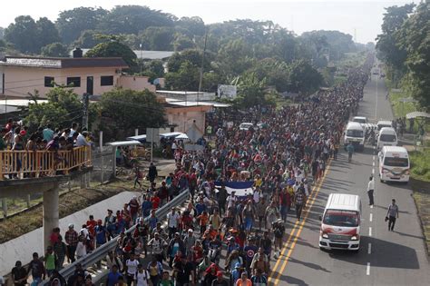 buses with caravan migrants escorted through mexico  He heard about the caravan in March when he arrived in Tapachula, the caravan's starting point
