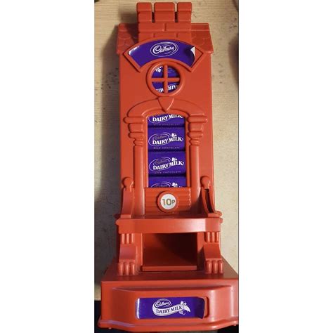 cadbury chocolate dispenser  From Mary Evans Picture Library and Greg Balfour Evans/Alamy, respectively