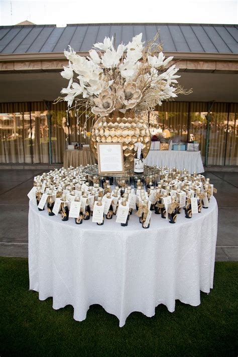 champagne escort card display  The Reine: Gold + Lucite Flatware Set