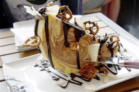 cheesecake challenge guy fieri  Creamy, rich NY-style cheesecake marbled with nuts and caramel and chocolate drizzle