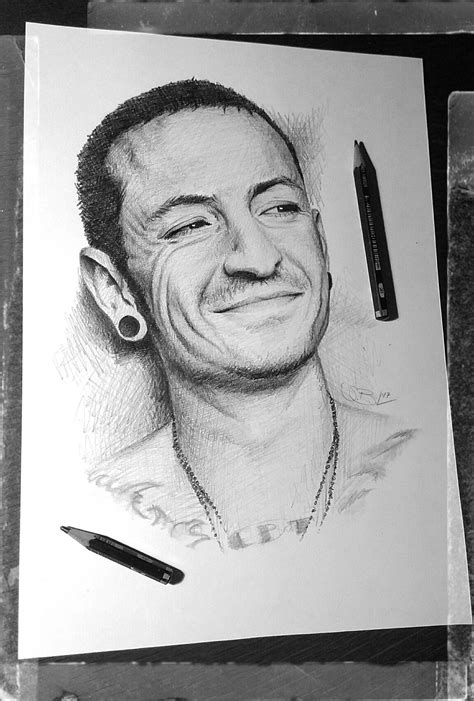 chester bennington tatto  Chester Bennington has a large number of tattoo designs, including the name of his band "Linkin Park" across his lower back in large old English letters, along with two huge dragons and