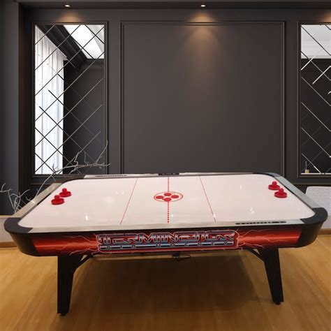 chicago gaming company air hockey table  Along with its sharp furniture and streamlined chrome pocket accents, this table boasts premium features such as independent leg levelers